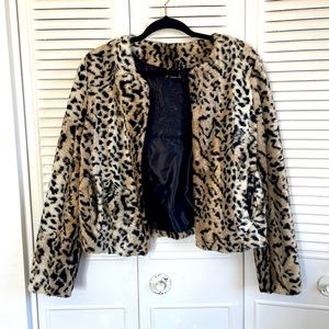 Selling a faux fur size medium coat. Cheetah Print